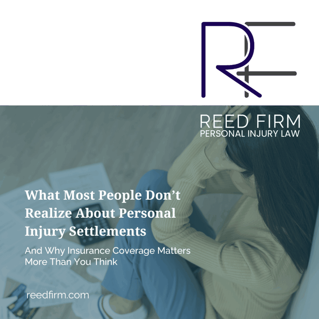 Person sitting with medical bills and documents, showing the financial stress involved in a personal injury settlement