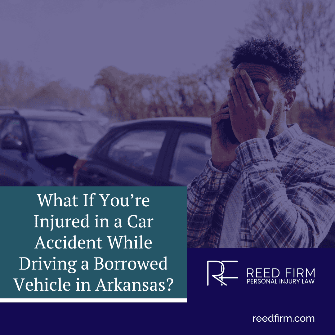 Driver speaking on the phone after a car accident involving a borrowed vehicle in Arkansas