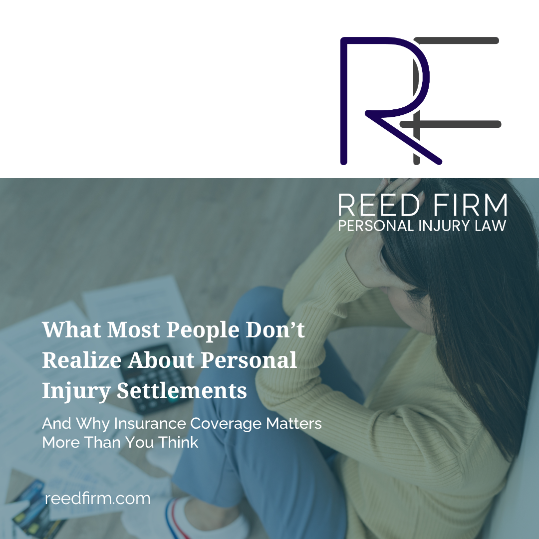 Person sitting with medical bills and documents, showing the financial stress involved in a personal injury settlement