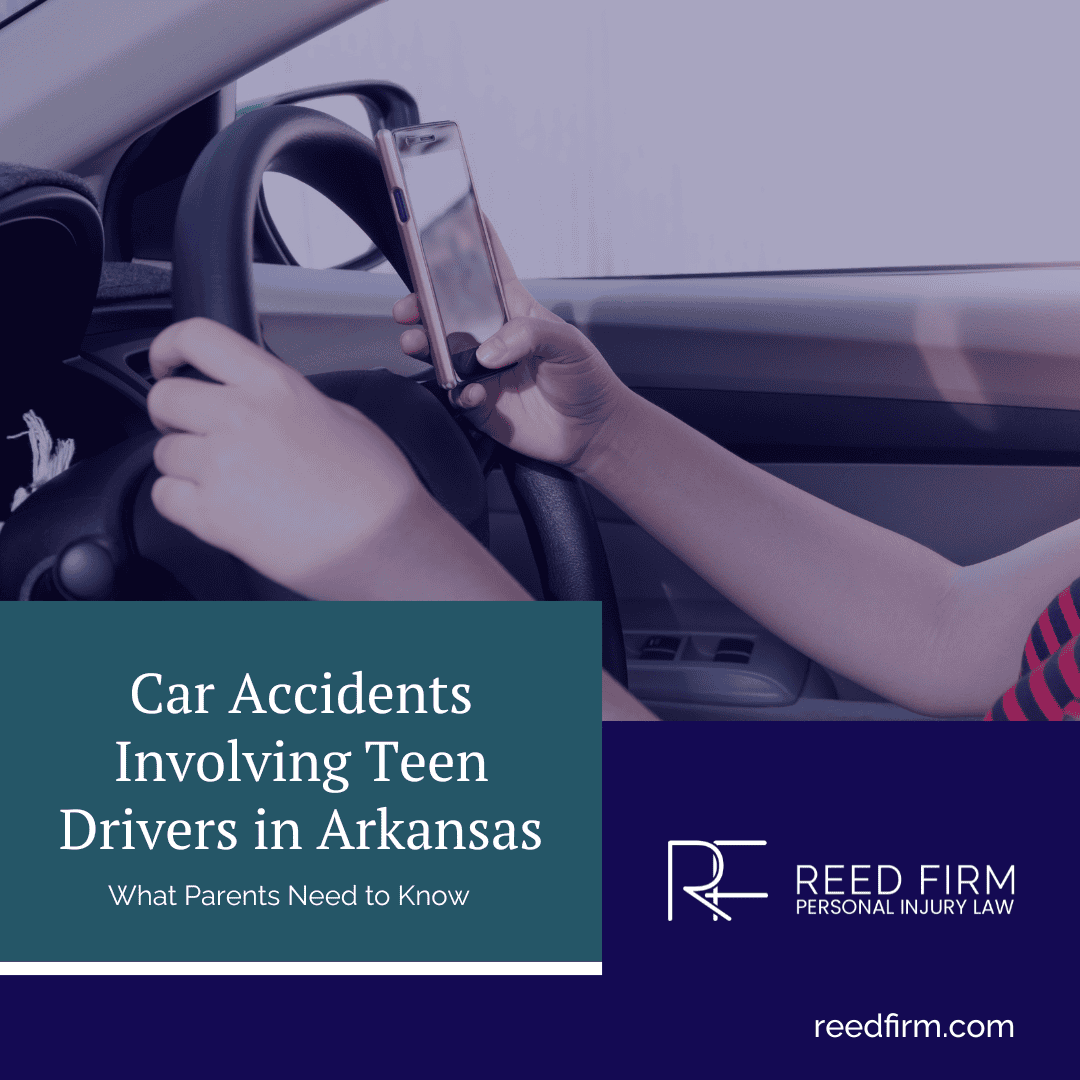 Teen driver holding a phone while driving, illustrating distracted driving risks in Arkansas car accidents